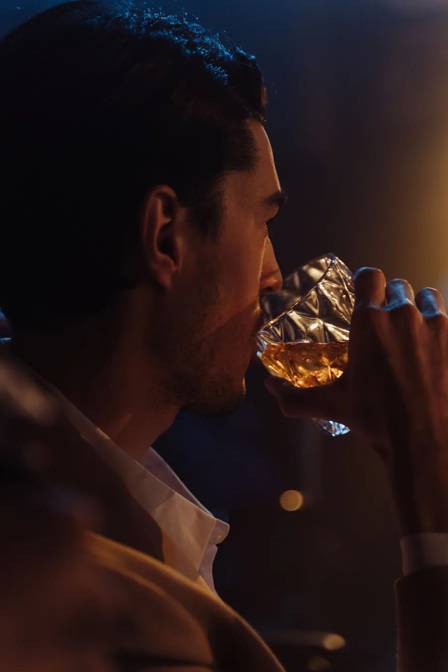 A collector savoring a bold rye whiskey
